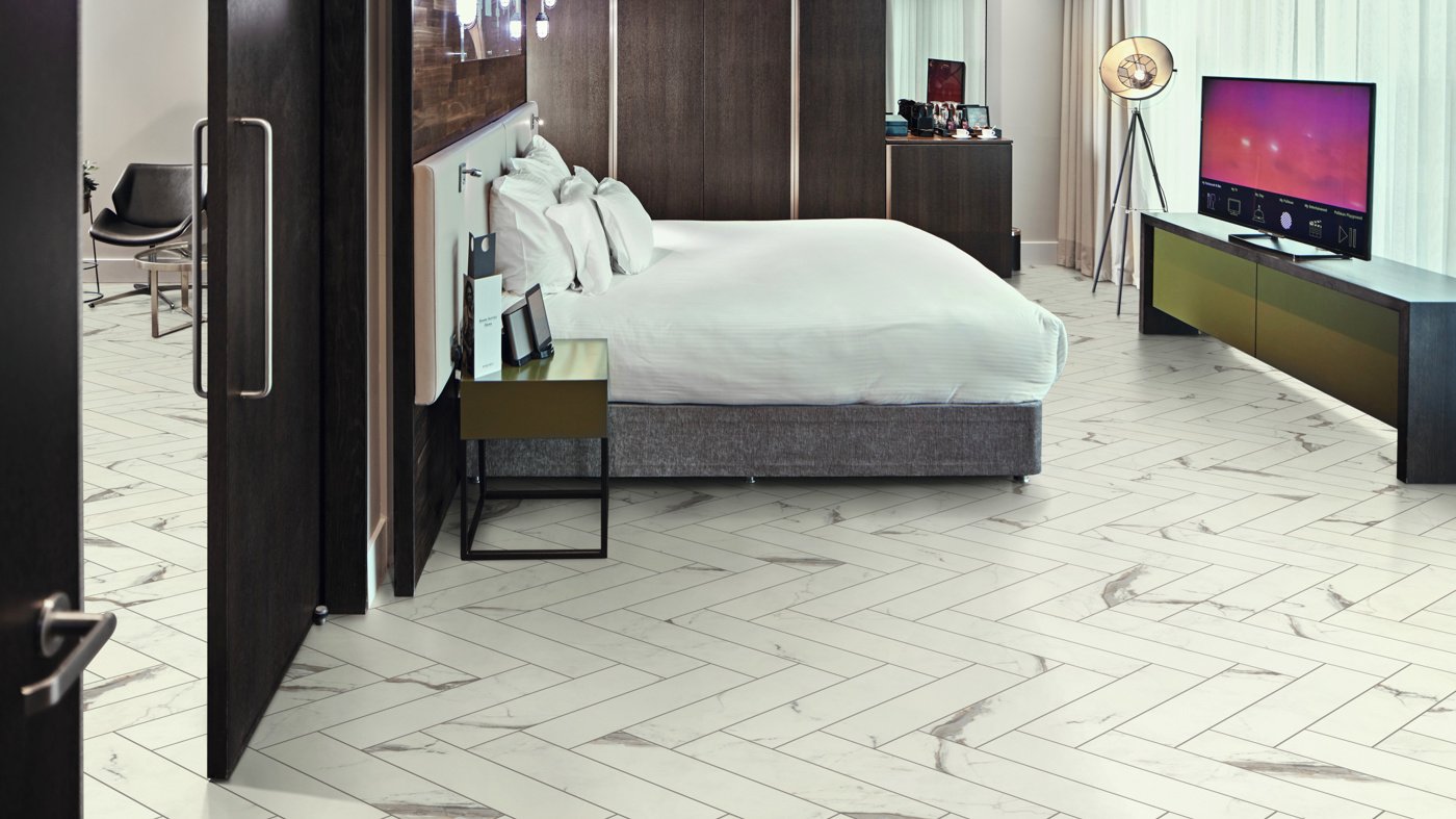 Hotel suite with Brunella Marble SM-RKT3013-G herringbone floors