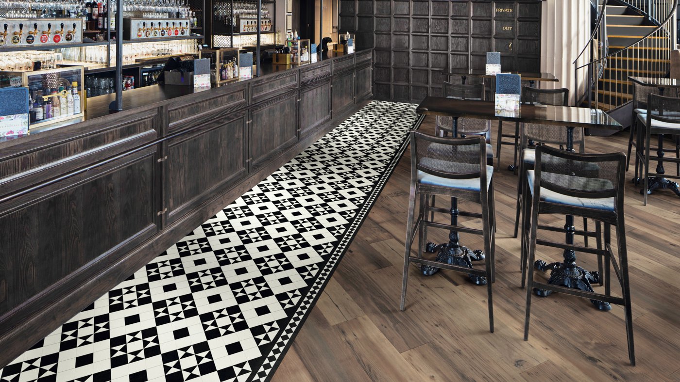 Clifton CLIF-01 Heritage tiles zone a bar area from the general seating