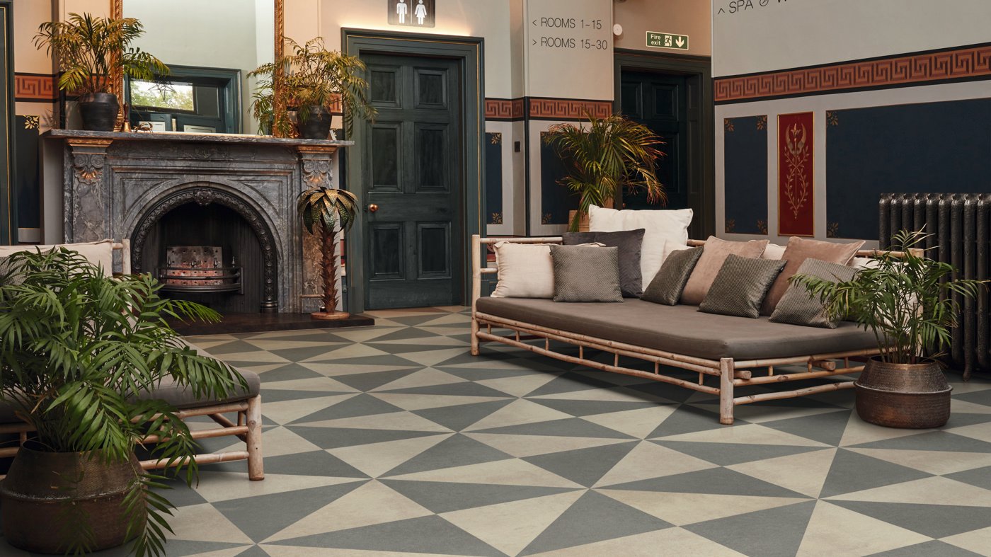 Hotel lobby with Terra SP212 and Urbus SP213 tiles in a modern triangular pattern