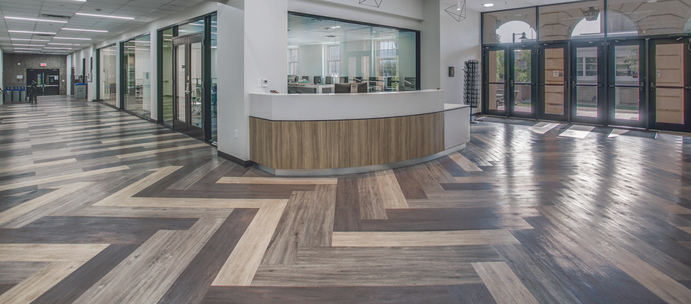 French Grey Oak LLP308, Raven Oak LLP302 and Pearl Oak LLP306 in a herringbone pattern in the University of North Texas's student union