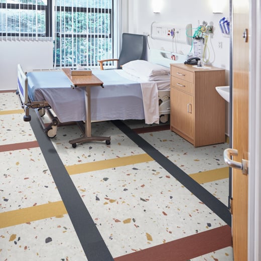 Hospital patient room with Burnt Sienna SP719, Indigo SP720, Yellow Ochre SP726 and Salute Grisio SP118 floors